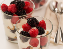 Raspberries & blackberries with granola and yoghurt